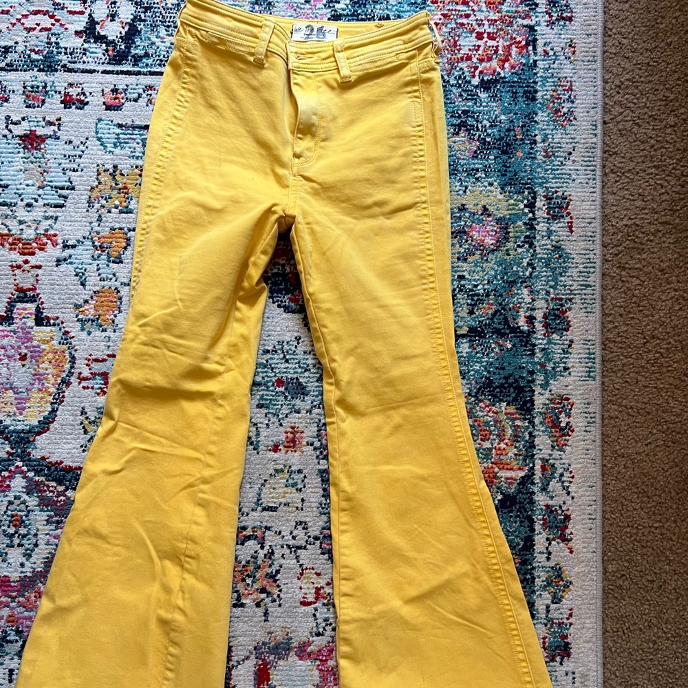 FREE PEOPLE yellow flare jeans size 26